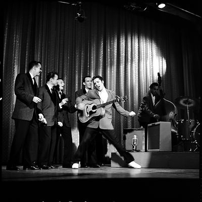 Elvis performs with The Jordanaires during an October 28, 1956 appearance on The Ed Sullivan Show.