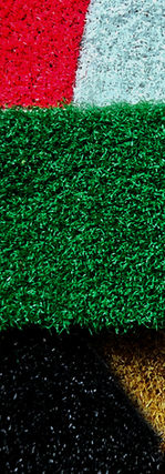 custom painted turf flooring with store logo for retail interiors