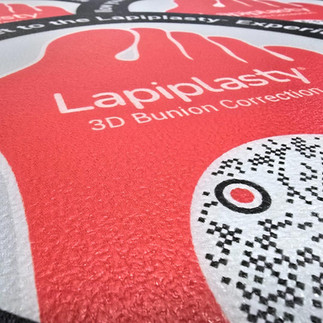 Macro view of the pebble-like textured slip resistant surface on an RPV floor graphic.