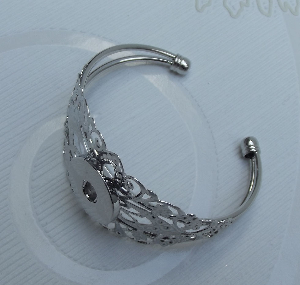 Miniature : Bracelet, filigrane argenté agrémenté d'un bouton pression