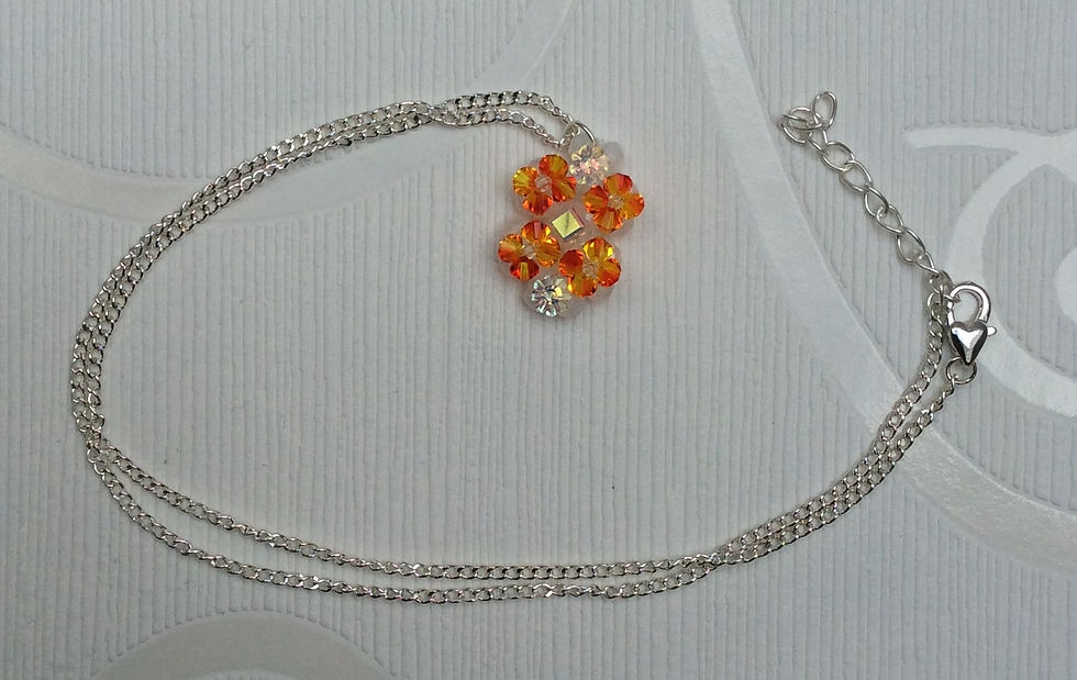 Miniature : Pendentif, le rectangle en perles swarovski orange jaune