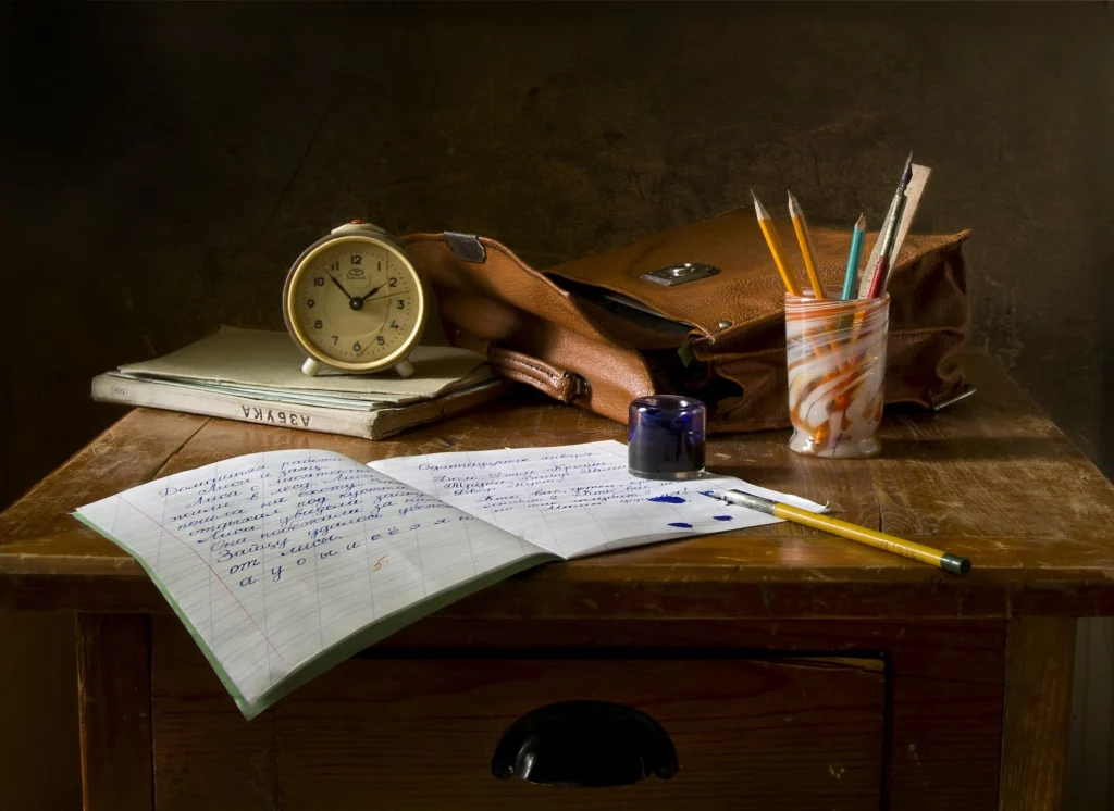 A table full of writing utensils