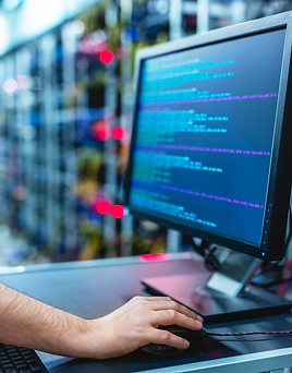 person using computer in IT room