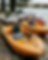 wbdteam_symmetrical_row_of_quirky_yellow_pedal_boats_with_built_740d0ba9-d5db-4532-918f-27