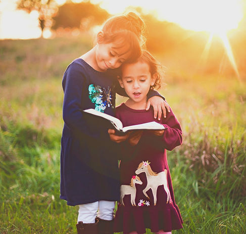 Girls and book_edited_edited_edited.jpg