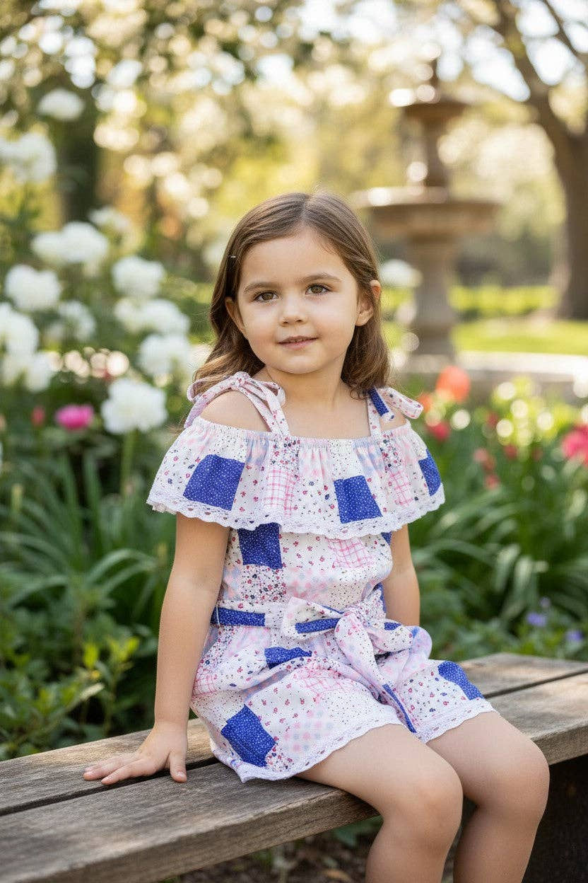 Royal blue Ditsy floral romper w/lace hem. PNG60332 AMY: XS (12-18M)