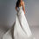 Thumbnail: R1908-Strapless contemporary gown with fluid draping on a-line skirt