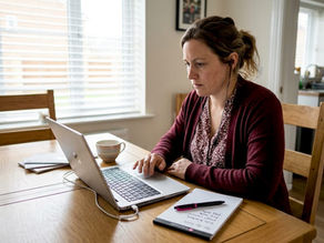 Woman using screen reader in home workspace