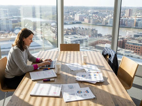 Marketer plans content at conference table