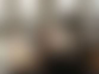 Social media manager at cluttered urban office desk