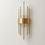 Thumbnail: Simple view the modern crystal wall light in gold from Elumin.