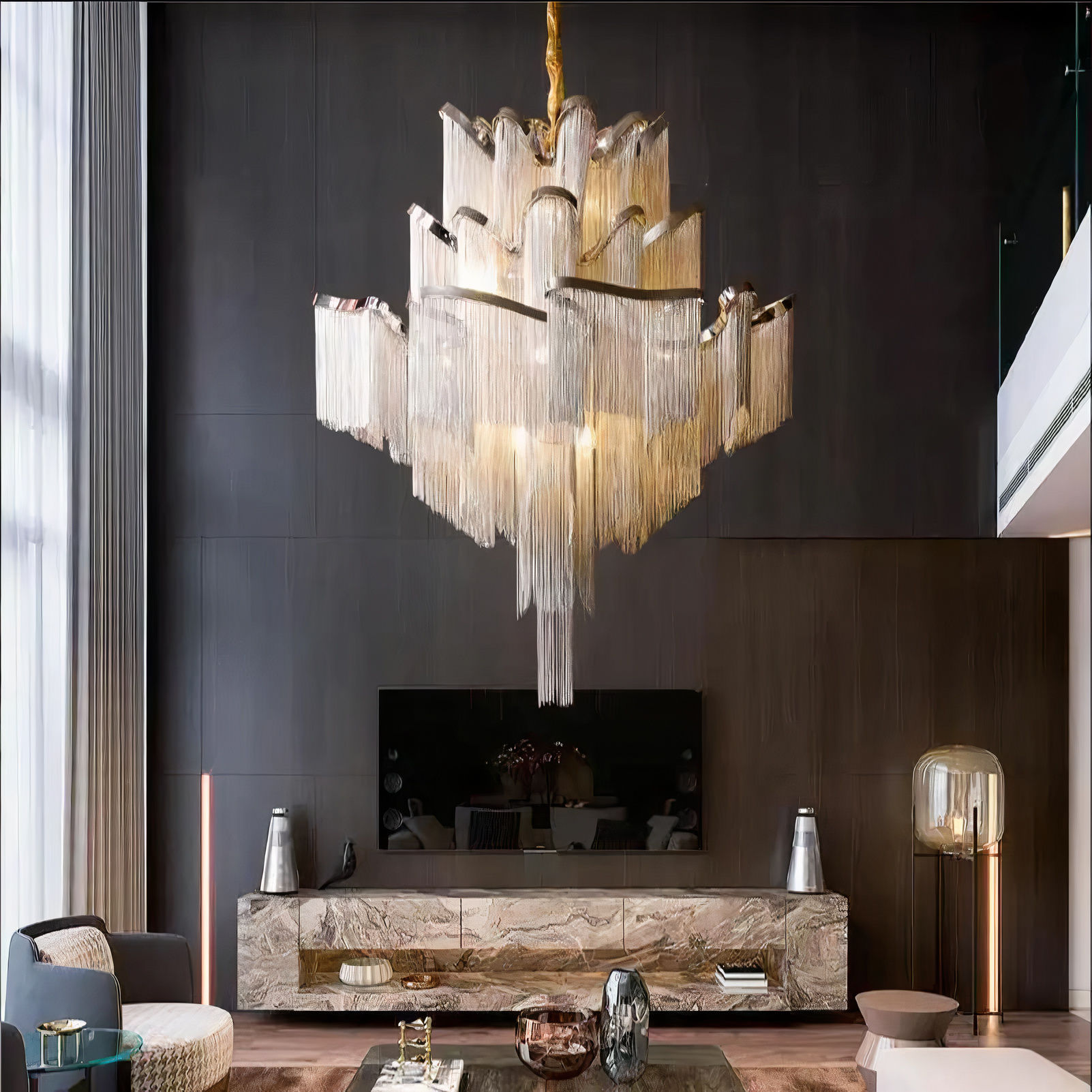 Villa lounge view the modern crystal chandelier and pendant lights with silver tassels by Elumin
