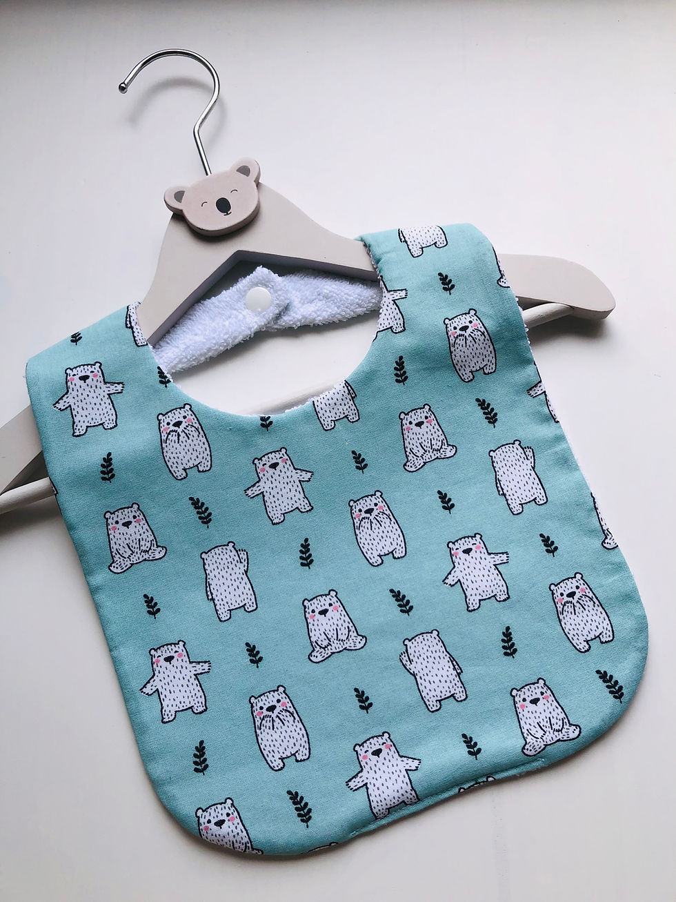 Miniature : Bavoir en coton et éponge motifs ours polaire