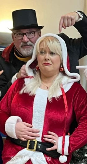 Who Shot Santa_ - Mrs Claus arrested by Inspector Frosty.jpg