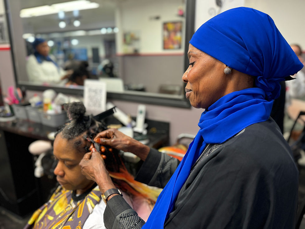 Protective styling for natural hair including braids, loc maintenance, and weaves in Danbury CT salon