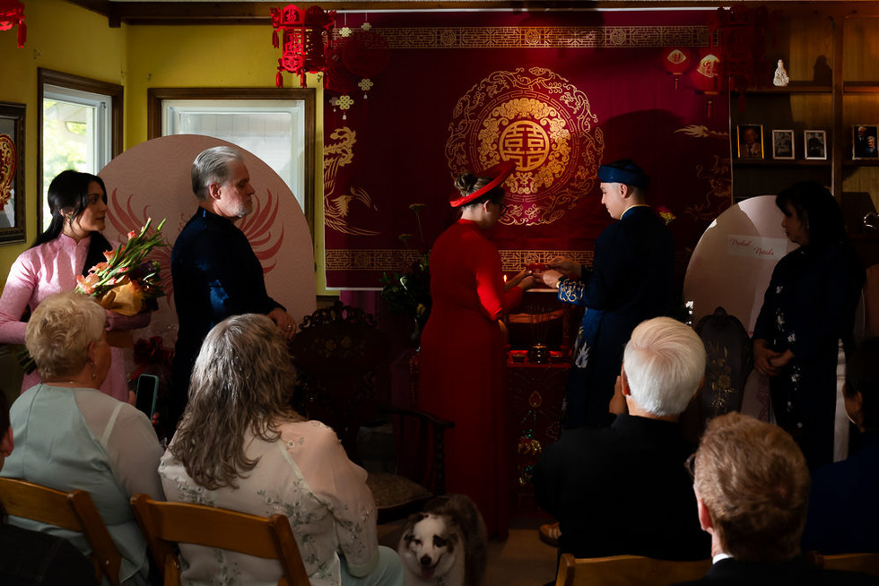 Bride and groom lighting incense