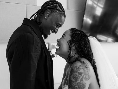 Jaya&Devonte full smiles, looking at each other, after the ceremony