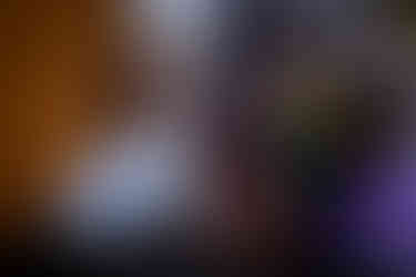 Three close family members in a fun discussion.