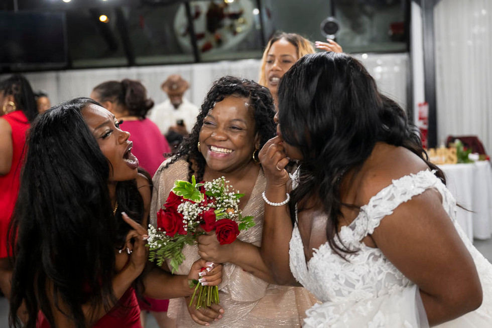 guest at wedding catching bouquet