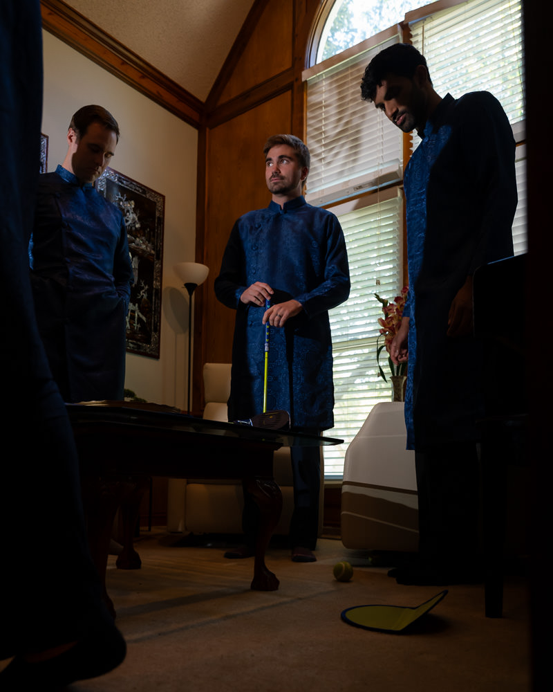 Groomsmen wearing traditional Vietnamese outfits before the tea ceremony