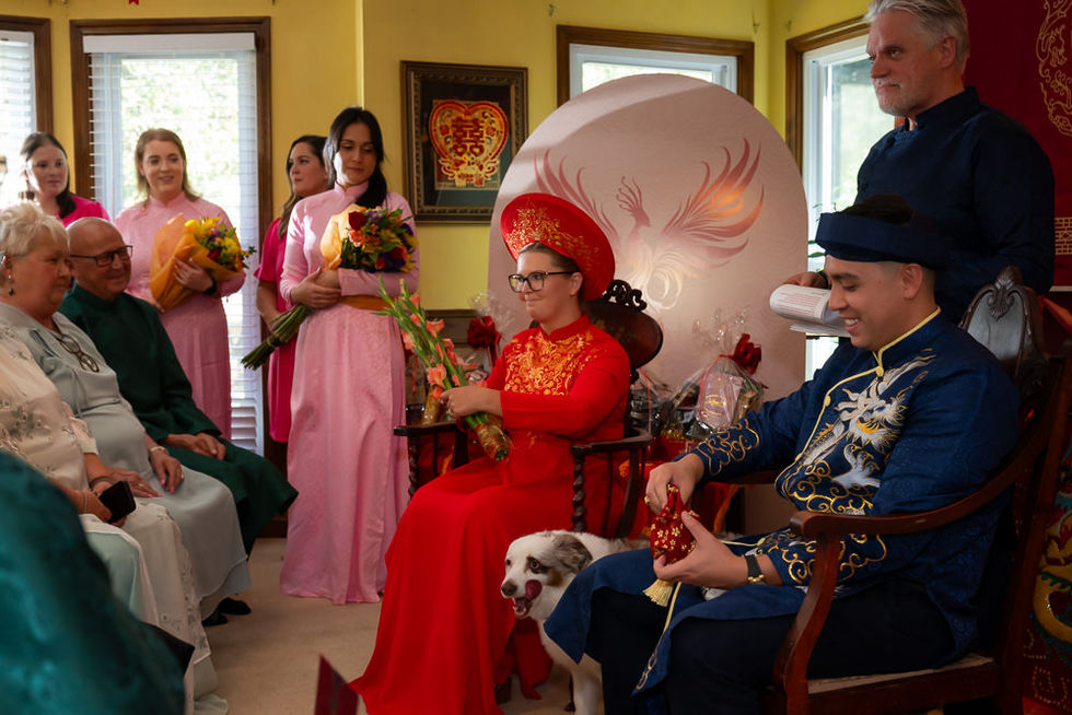 Bride and groom sitting at the Vietnamese Tea ceremony