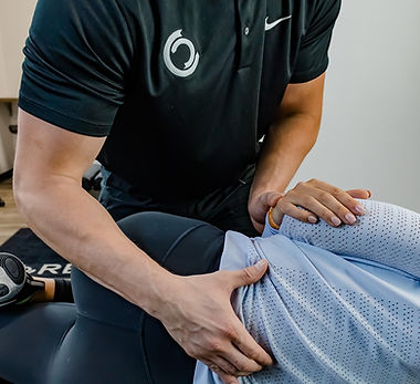 Dr. Tanner delivering precise chiropractic care during an adjustment session to support spinal health and overall wellness at Core Chiropractic.
