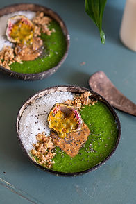 Green smoothie bowl with passionfruit and peanut