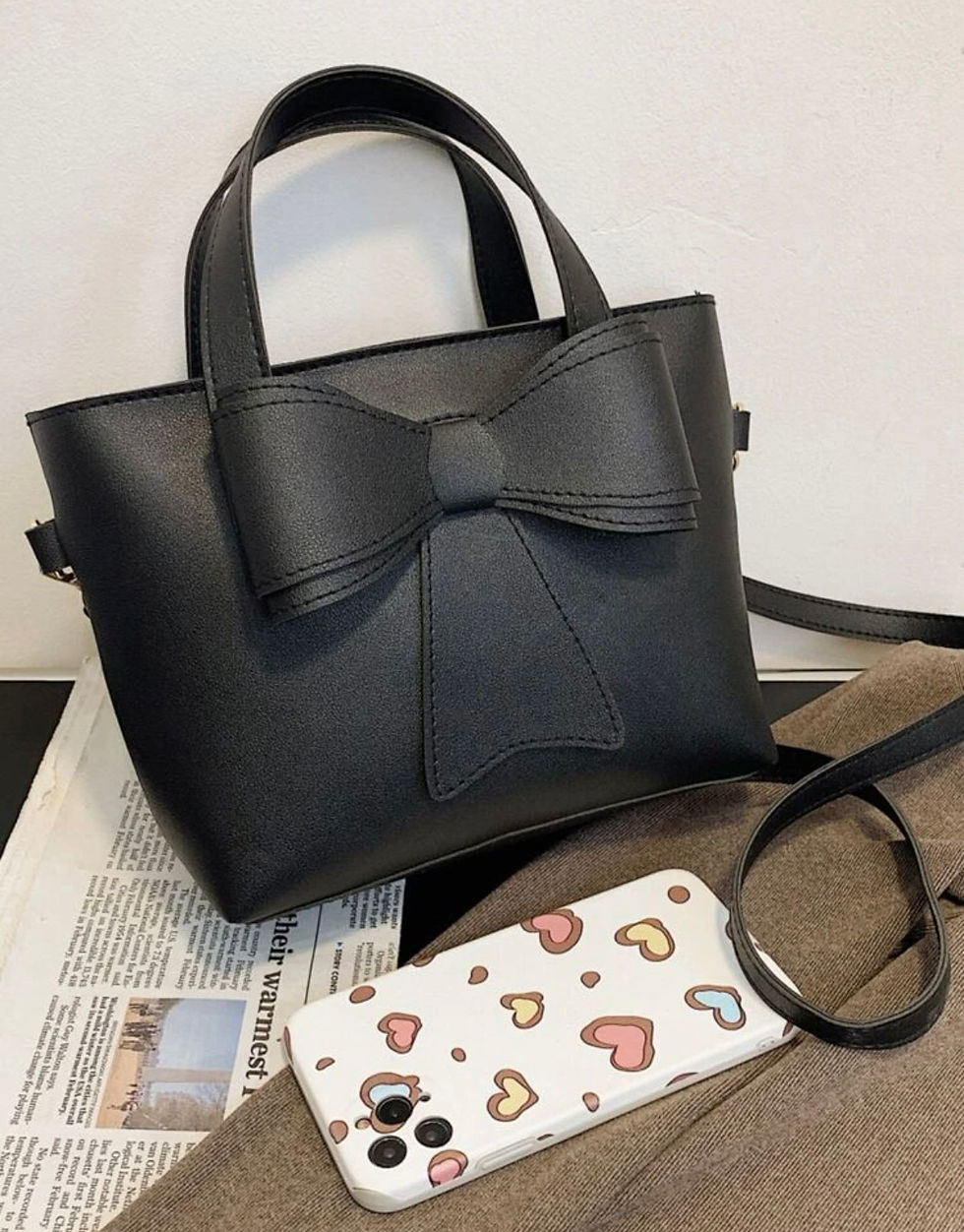 الصورة المصغرة: حقائب مزخرف بقوس T4