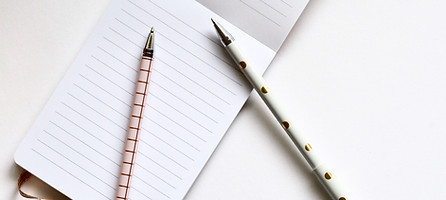 Two Pens on Notebook