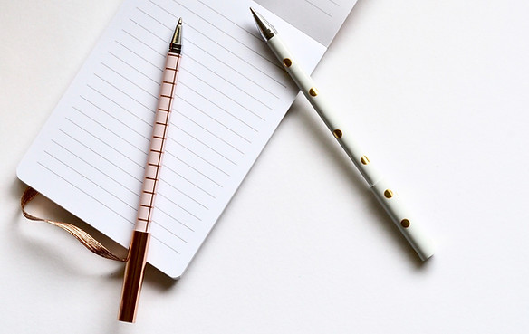 Two Pens on Notebook