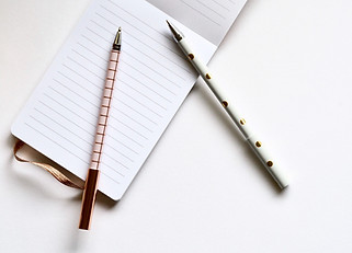 Two Pens on Notebook