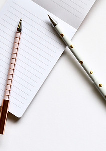 Two Pens on Notebook