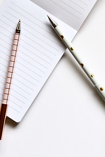 Two Pens on Notebook