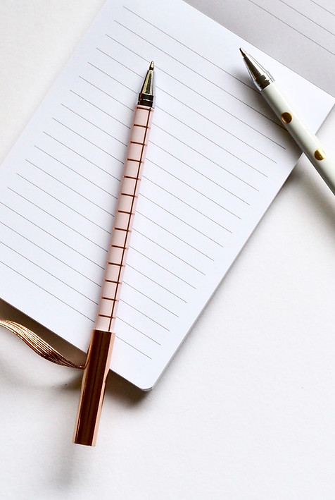 Two Pens on Notebook