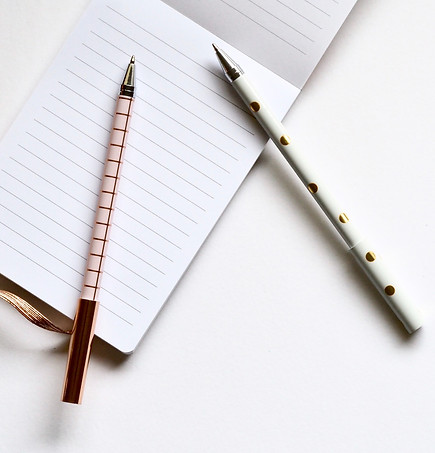 Two Pens on Notebook