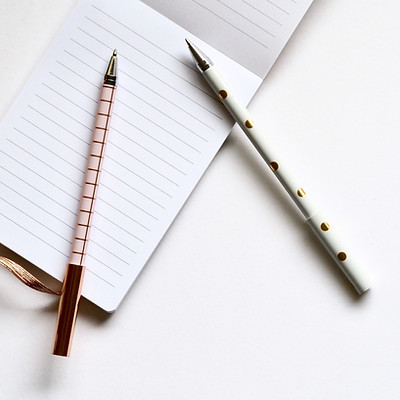 Two Pens on Notebook