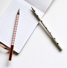 Two Pens on Notebook