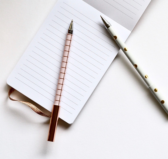 Two Pens on Notebook