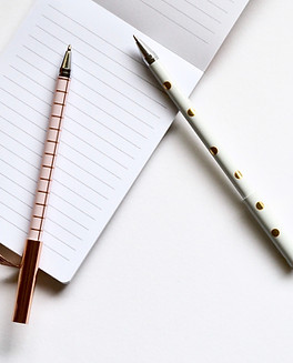Two Pens on Notebook