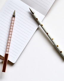 Two Pens on Notebook