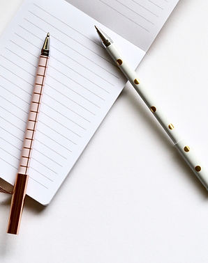 Two Pens on Notebook