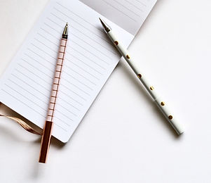 Two Pens on Notebook