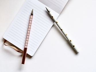 Two Pens on Notebook