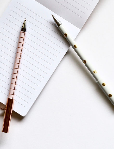 Two Pens on Notebook