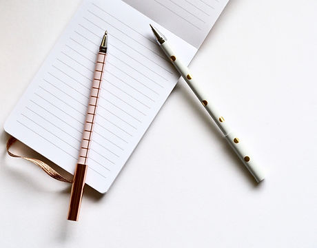 Two Pens on Notebook