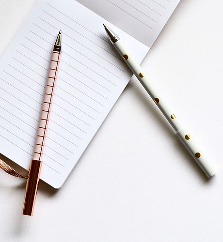 Two Pens on Notebook