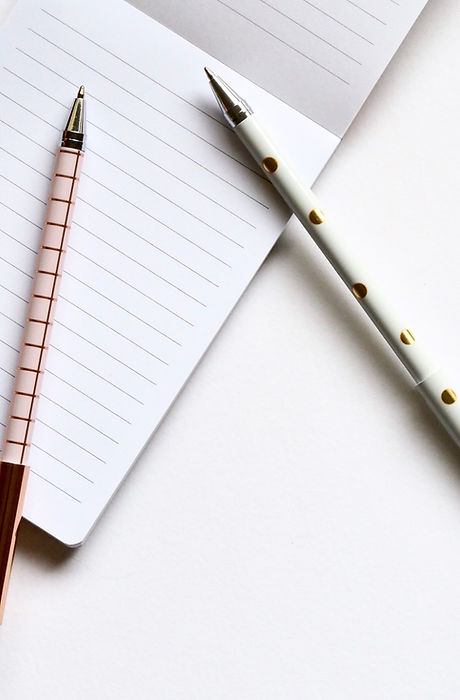 Two Pens on Notebook