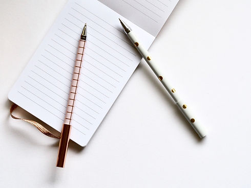 Two Pens on Notebook