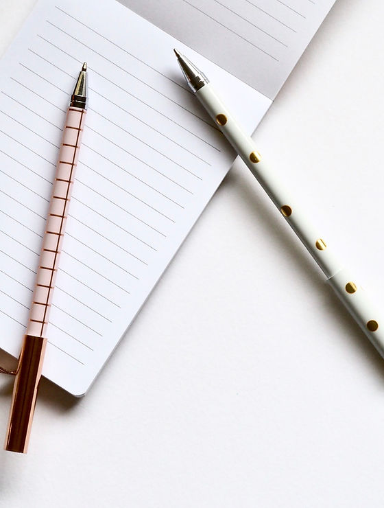 Two Pens on Notebook
