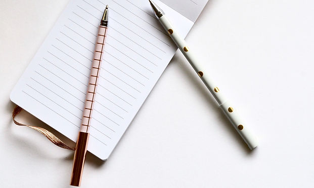 Two Pens on Notebook